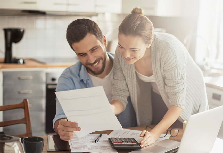 couple looking over bills together